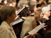 Returning members sing Wise Mother