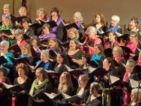 Chorus wearing scarves