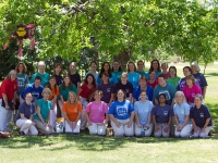 Posing for a group photo under a big tree at Cental Market