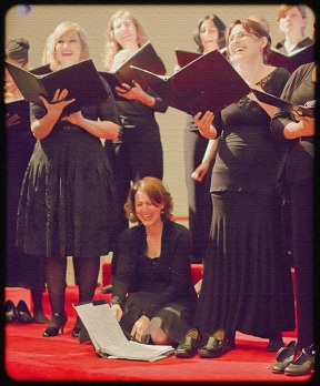 Tapestry Singers laughing during rehearsal